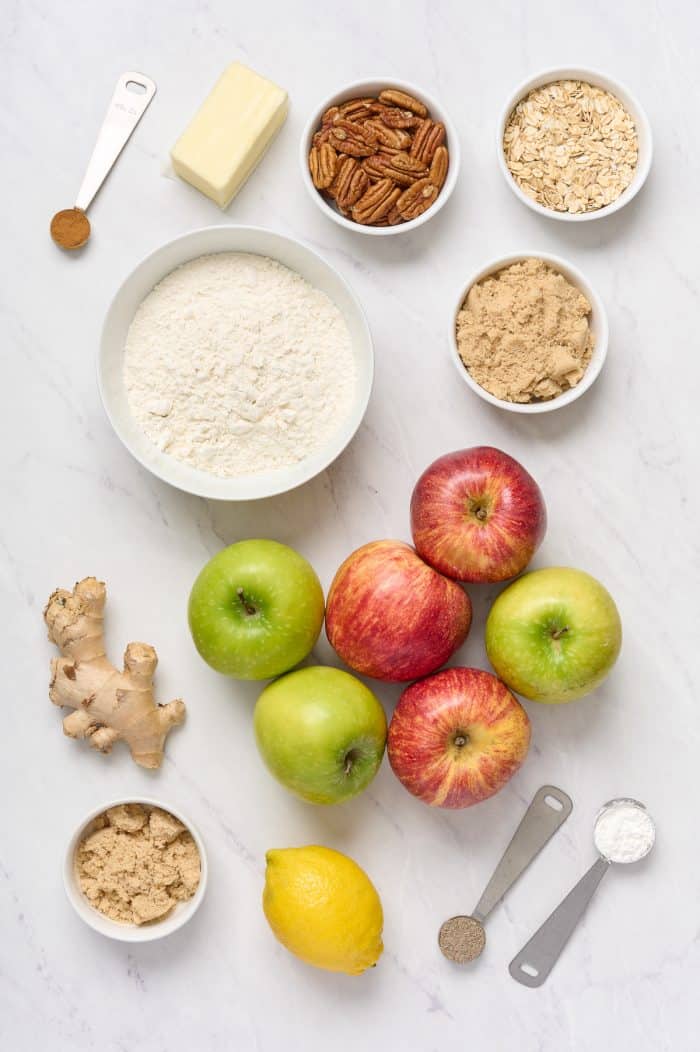 The ingredients to make an apple crisp with cardamom.
