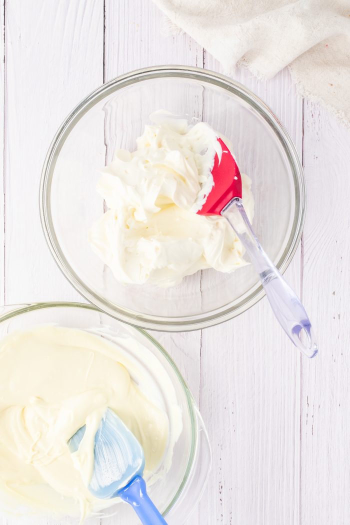 Whipped cream in a glass bowl.