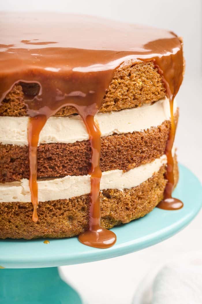 Pumpkin Layer Cake with caramel drizzled overtop. 