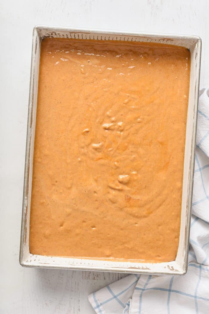 A cake pan with cake batter.