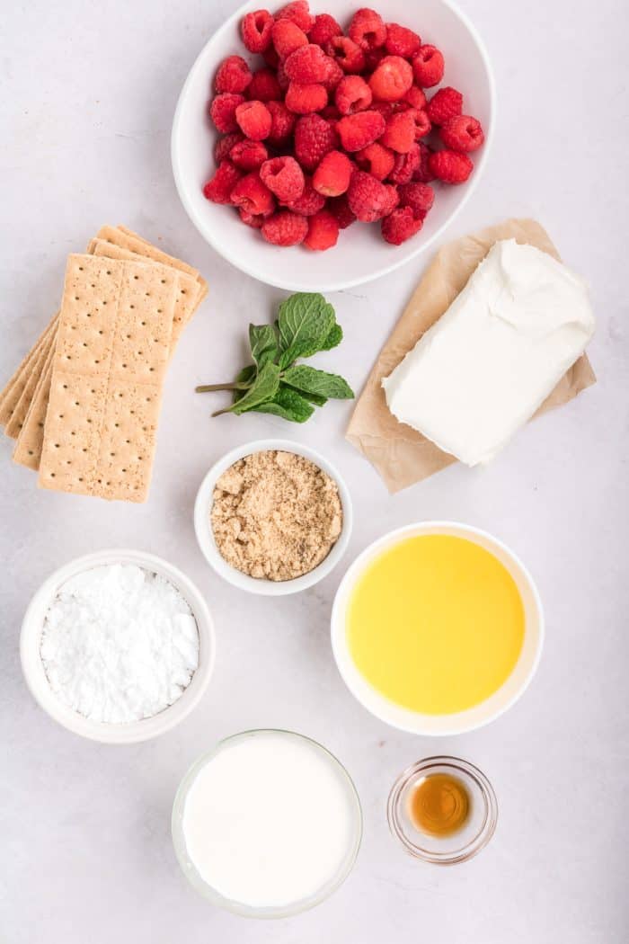 The ingredients in bowls for the raspberry mousse.