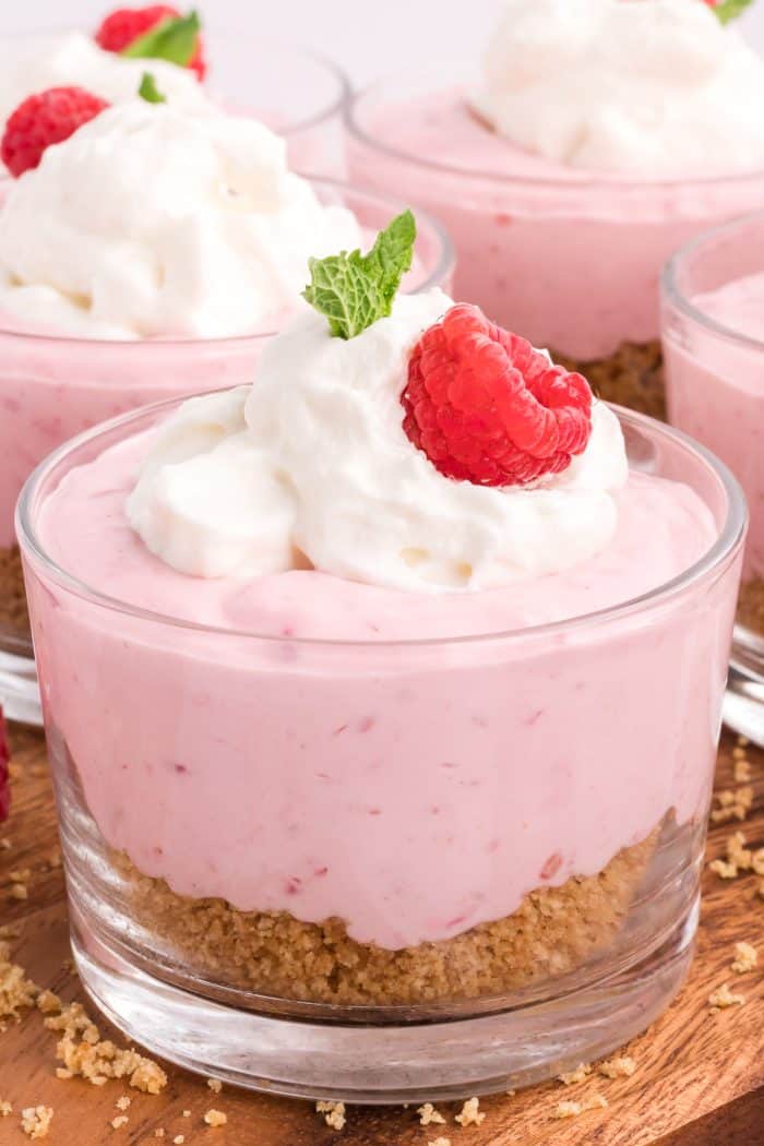 A glass serving dish with raspberry mousse.