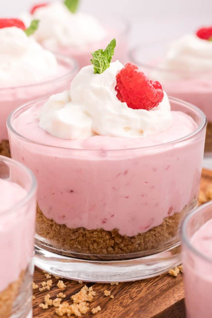 A glass serving dish with raspberry mousse.