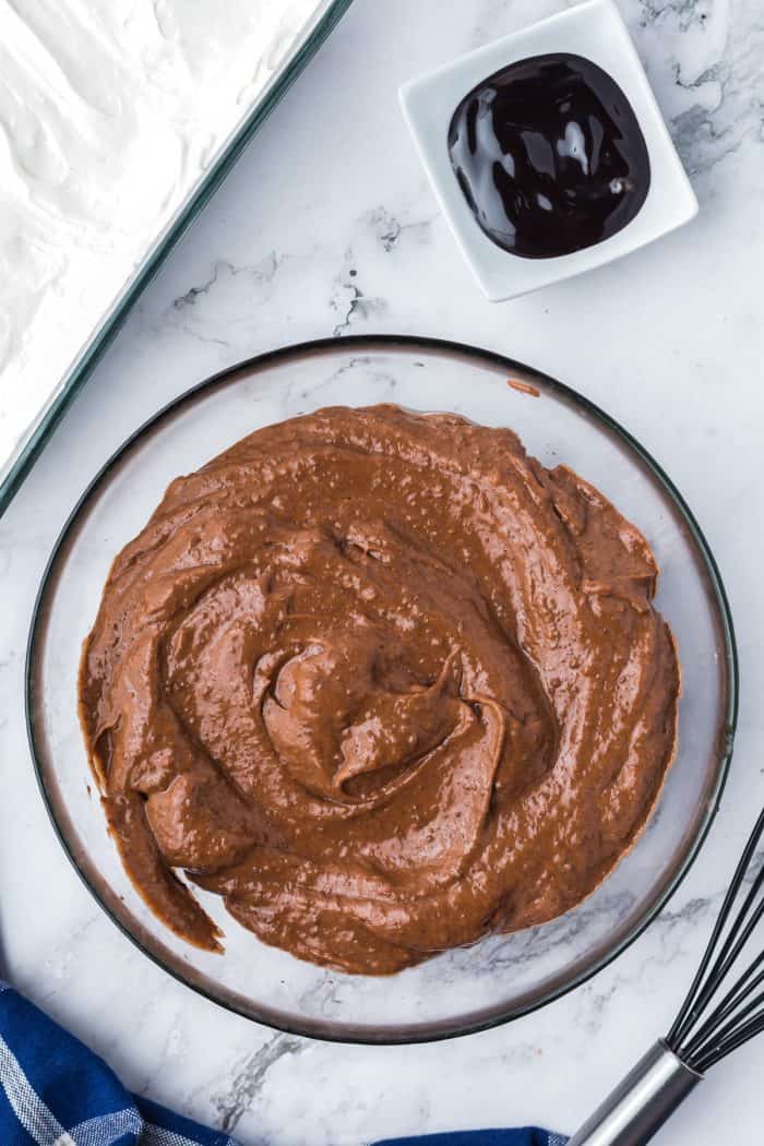 A glass bowl with the chocolate pudding.