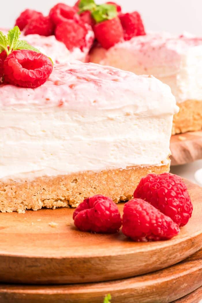 An up close image of a no bake raspberry lemon cheesecake.