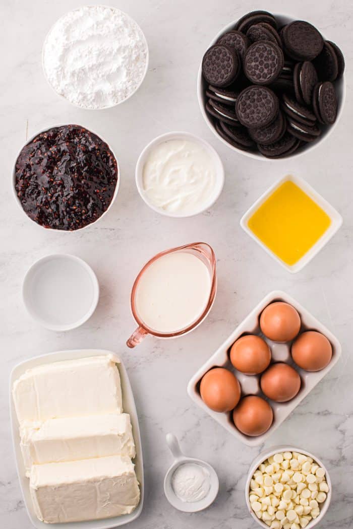 Ingredients for white chocolate raspberry cheesecake bars.
