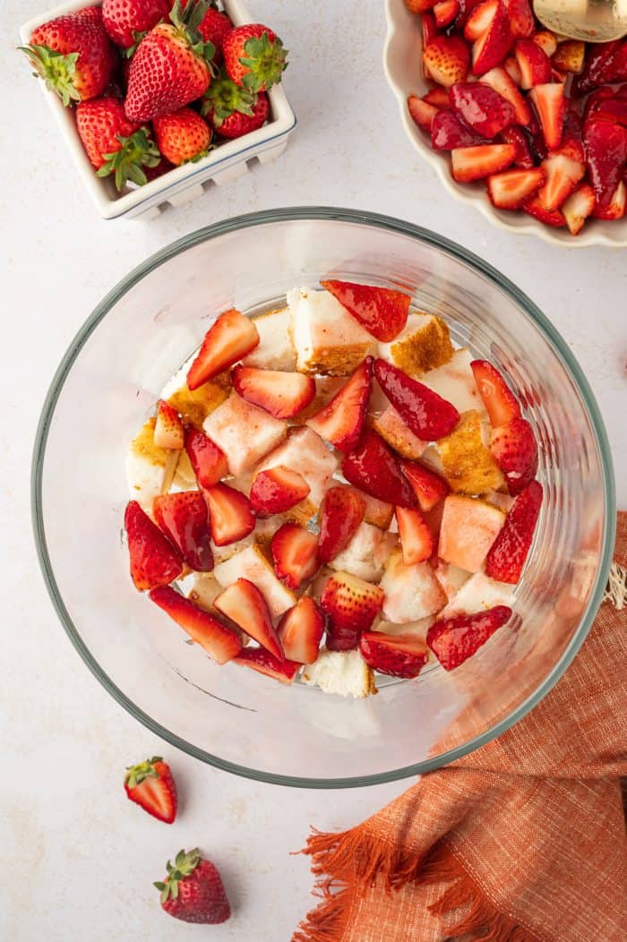 A trifle bowl filled with strawberries.