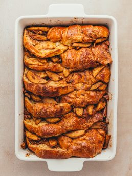 Baked apple french toast with croissants.