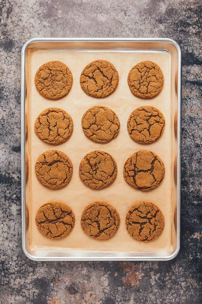 A cookie tray with baked double ginger molasses cookies.