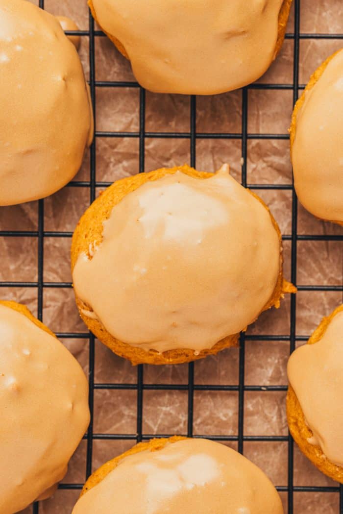 Pumpkin spice latte cookies on a cooling rack.