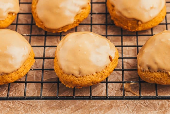 Pumpkin spice latte cookies on a cooling rack.