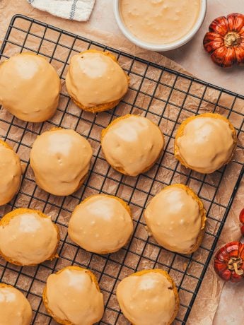 Pumpkin spice latte cookies on a cooling rack.