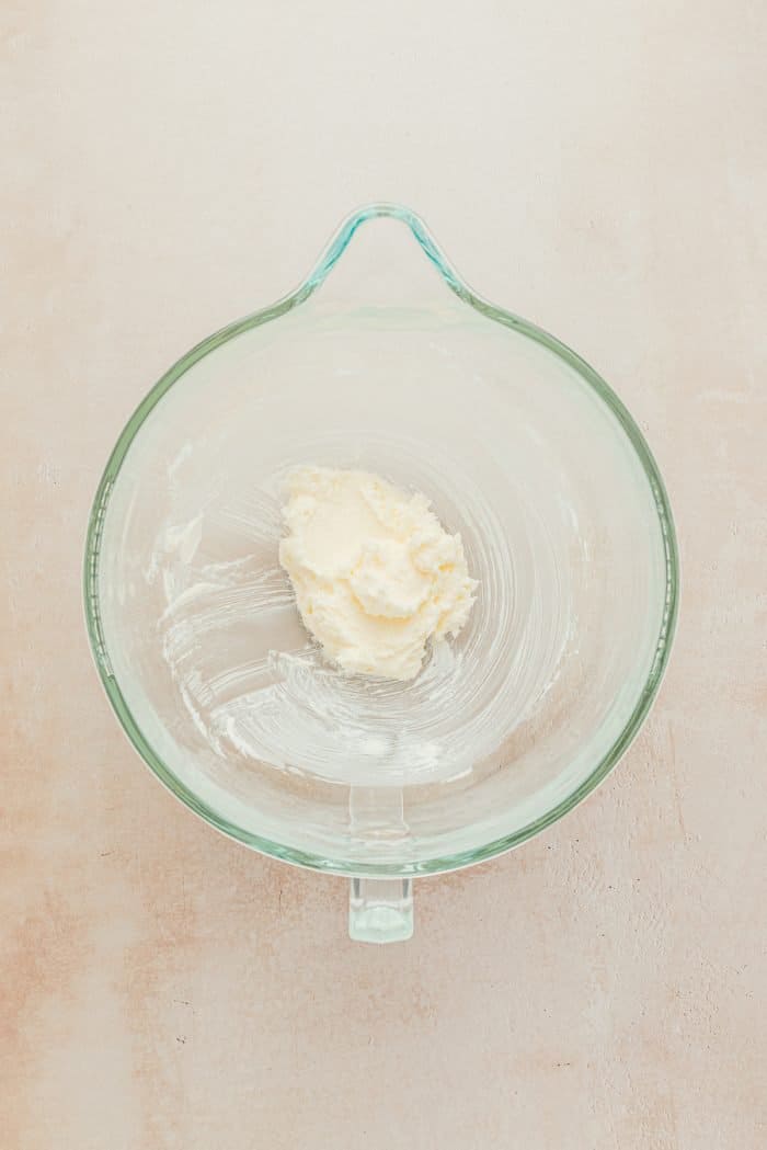 A glass bowl with butter.