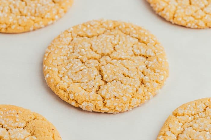 Various brown butter cookies on parchment paper. 