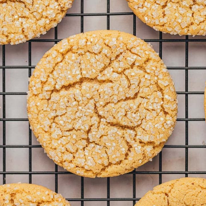 A cooling rack with various browned butter sugar cookies.