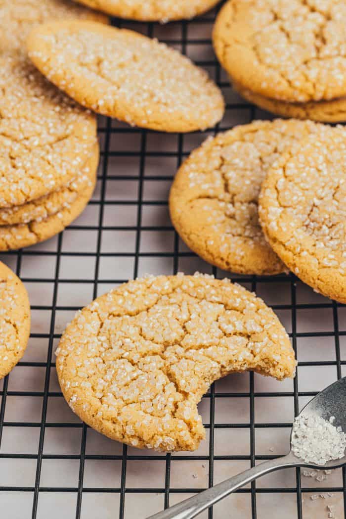 A cooling rack with various browned butter sugar cookies.