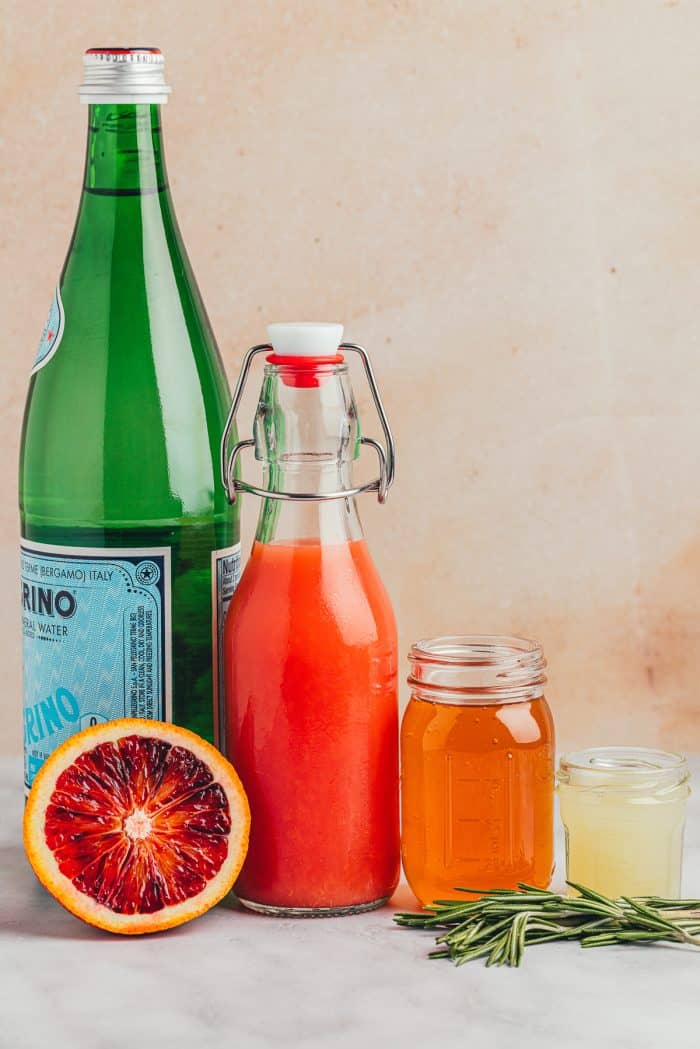 Ingredients for making a blood orange mocktail.