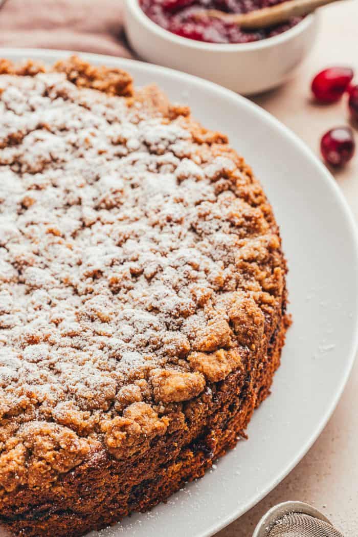 An up close look of the coffee cake with powdered sugar sprinkled over it.