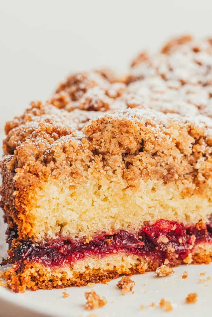 An upclose view of the cranberry jam center of the holiday coffee cake.