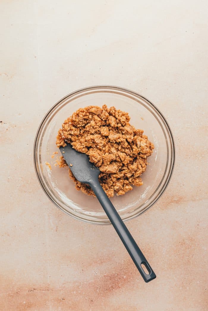 The ingredients for the crumble in a glass bowl.