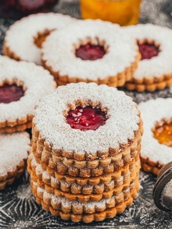 A stack of hazelnut Linzer cookies