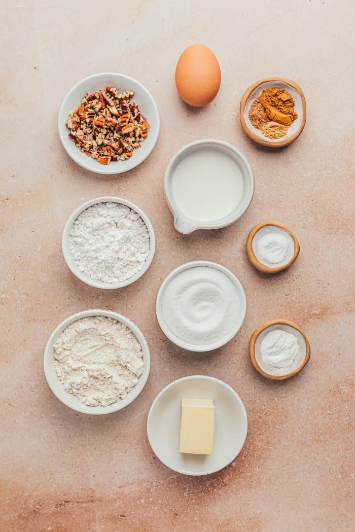 Bowls with ingredients for spice drop cookies.