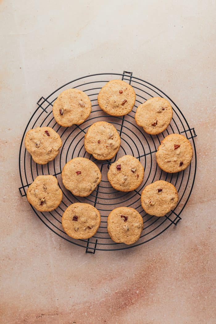 Baked cookies cooling on a cooling rack.