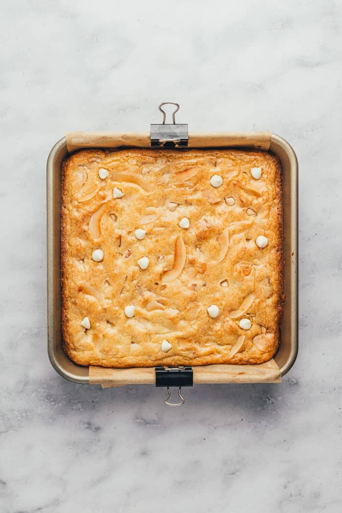 A baking tray with baked lemon blondies.