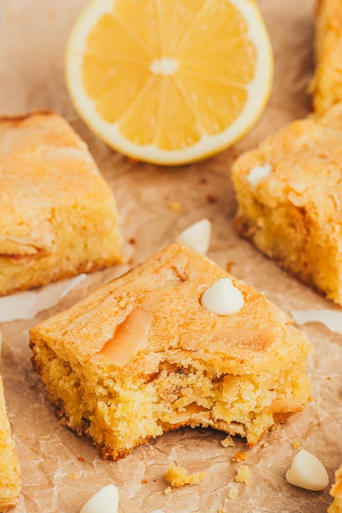 A lemon blondie with a bite taken out of it.