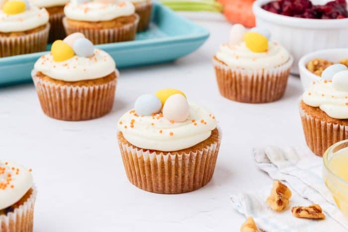 Decorated carrot cake cupcakes.