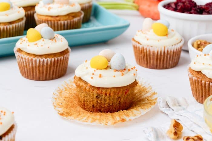 Decorated carrot cake cupcakes.