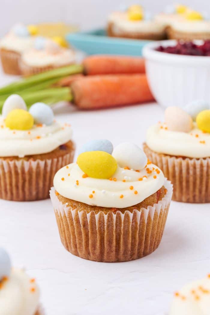 Decorated carrot cake cupcakes.