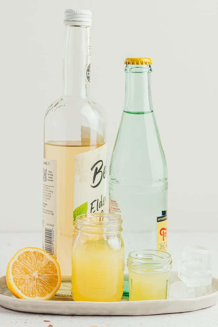 The ingredients needed to make a lemon elderflower mocktail.