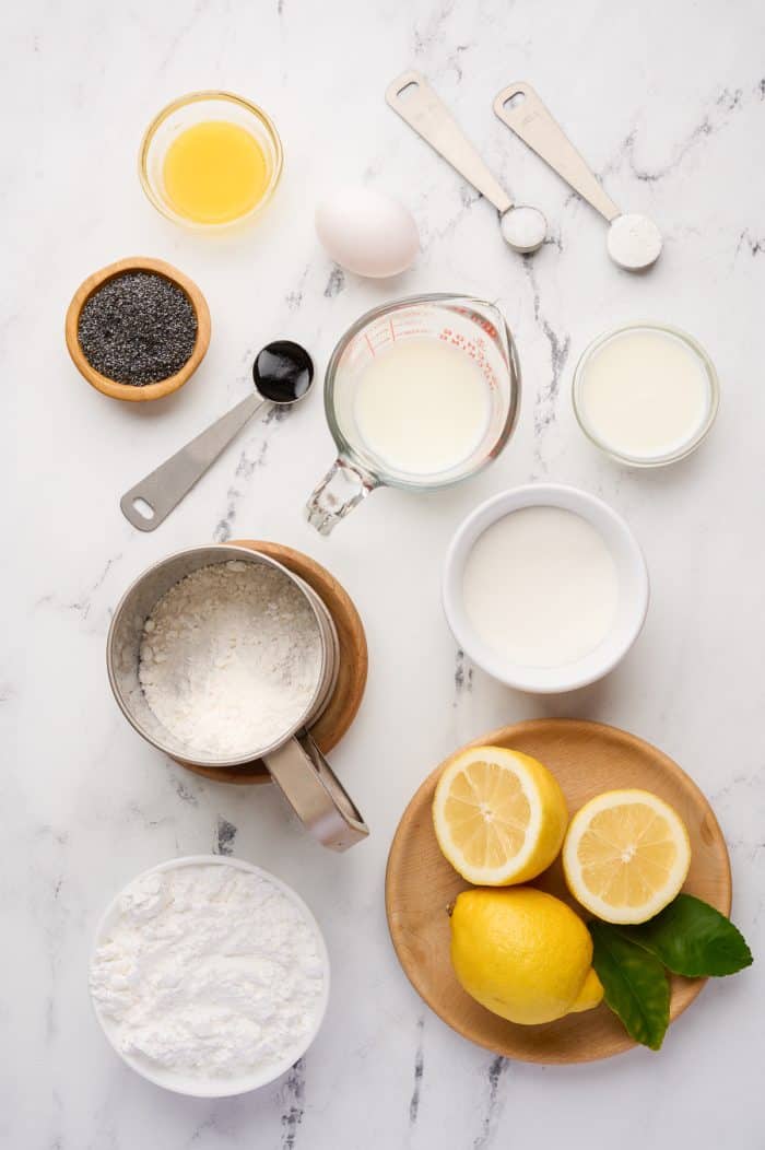 The ingredients needed to make lemon poppyseed donuts.