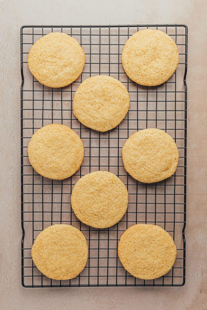 Baked lemon sugar cookies on a cooling rack.