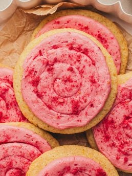 Lemon sugar cookies with raspberry cream cheese frosting.