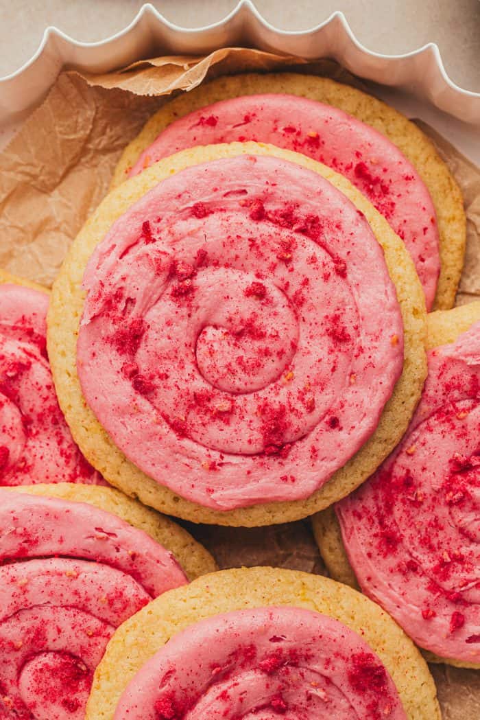 Lemon sugar cookies with raspberry cream cheese frosting.