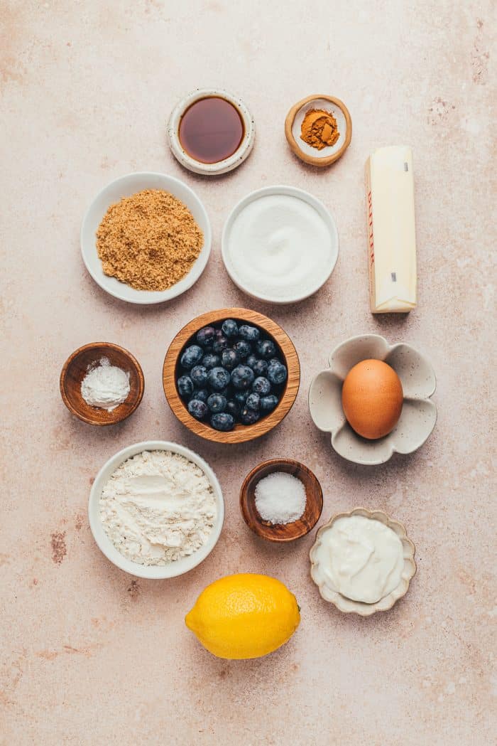 The ingredients used to make blueberry crumb cake.
