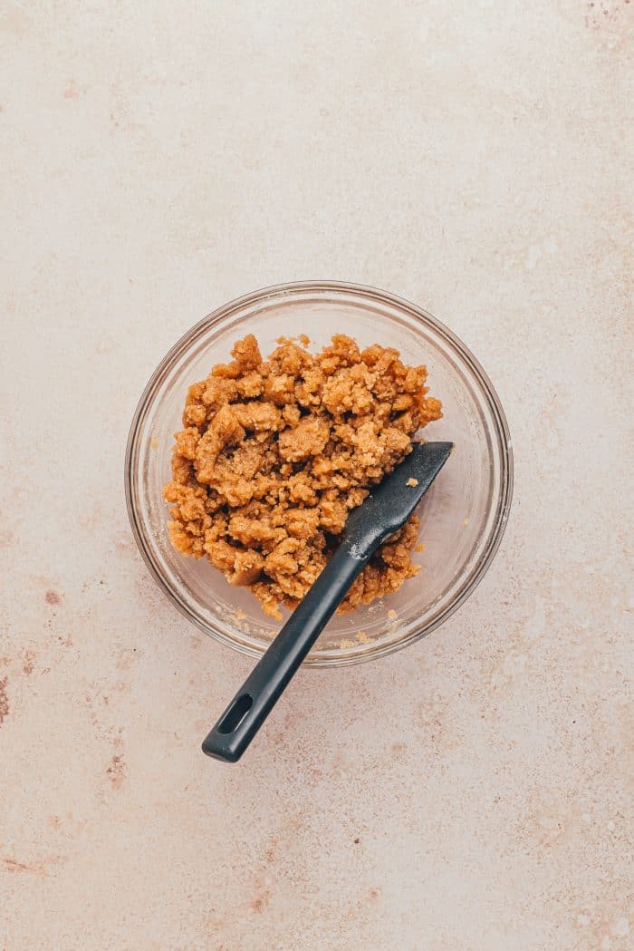 The crumb mixture in a glass bowl.