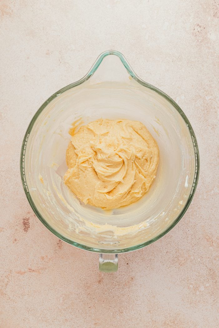 The cake batter mixture in a mixing bowl.