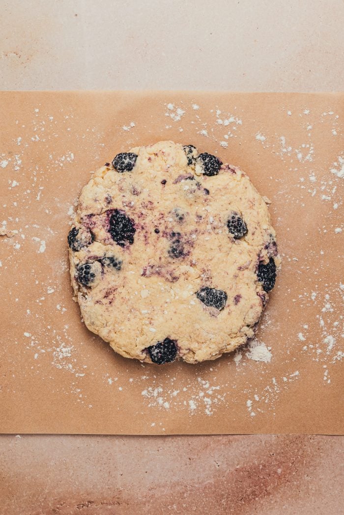 A disc of blackberry scone dough.