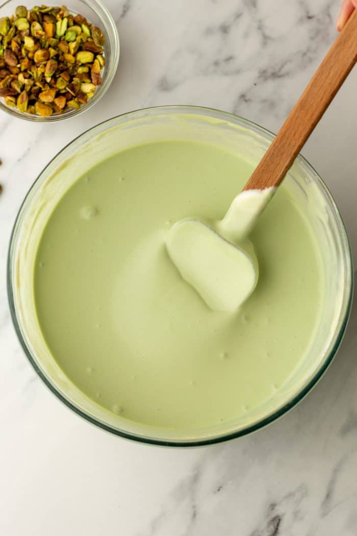 Whipped cream folded into pistachio mixture.