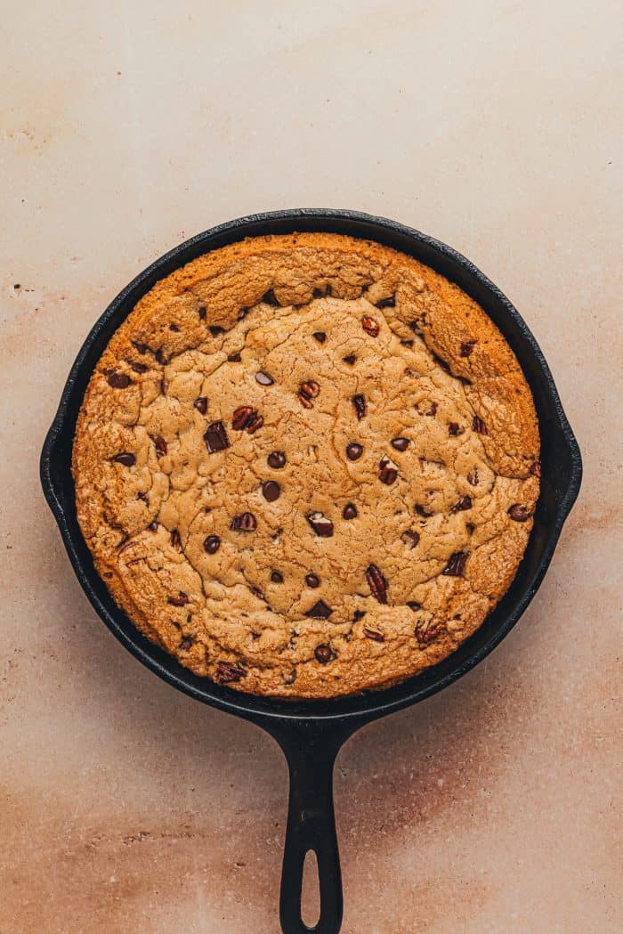Cooled chocolate chip pecan skillet cookie.