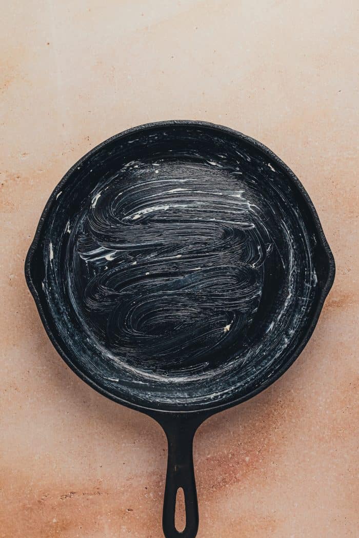 A greased cast iron skillet.