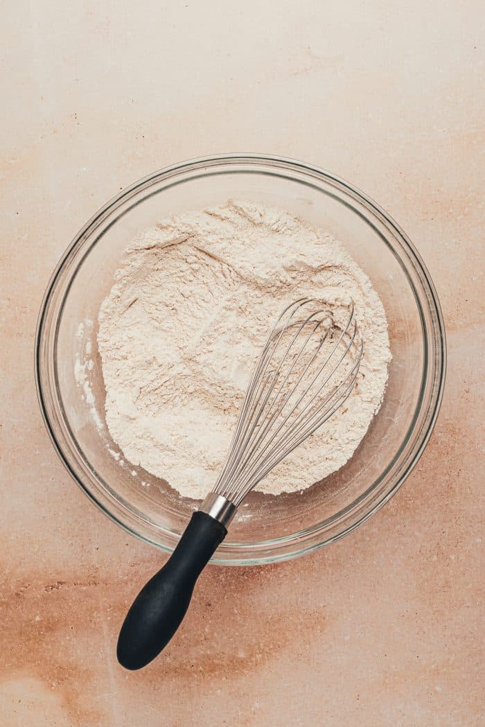 The dry ingredients mixed in a glass bowl.