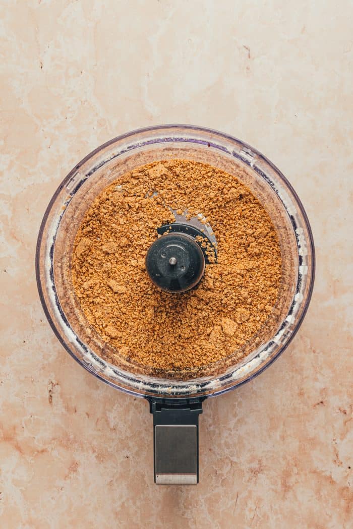 The pulsed hazelnuts in a food processor.