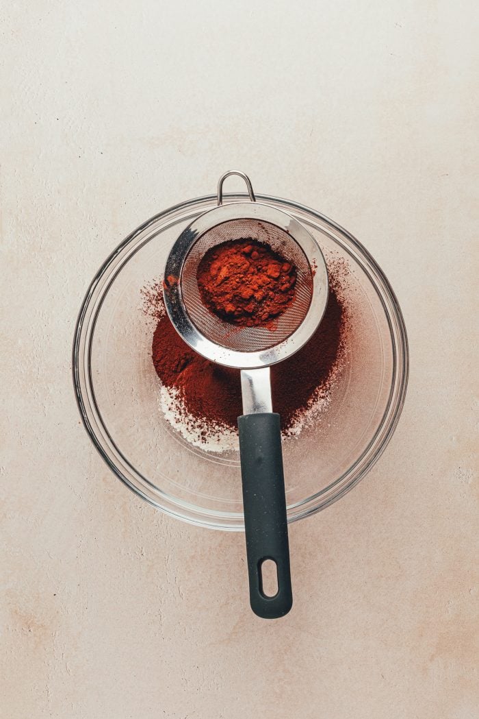 Sift the cocoa powder and flour into a glass bowl.