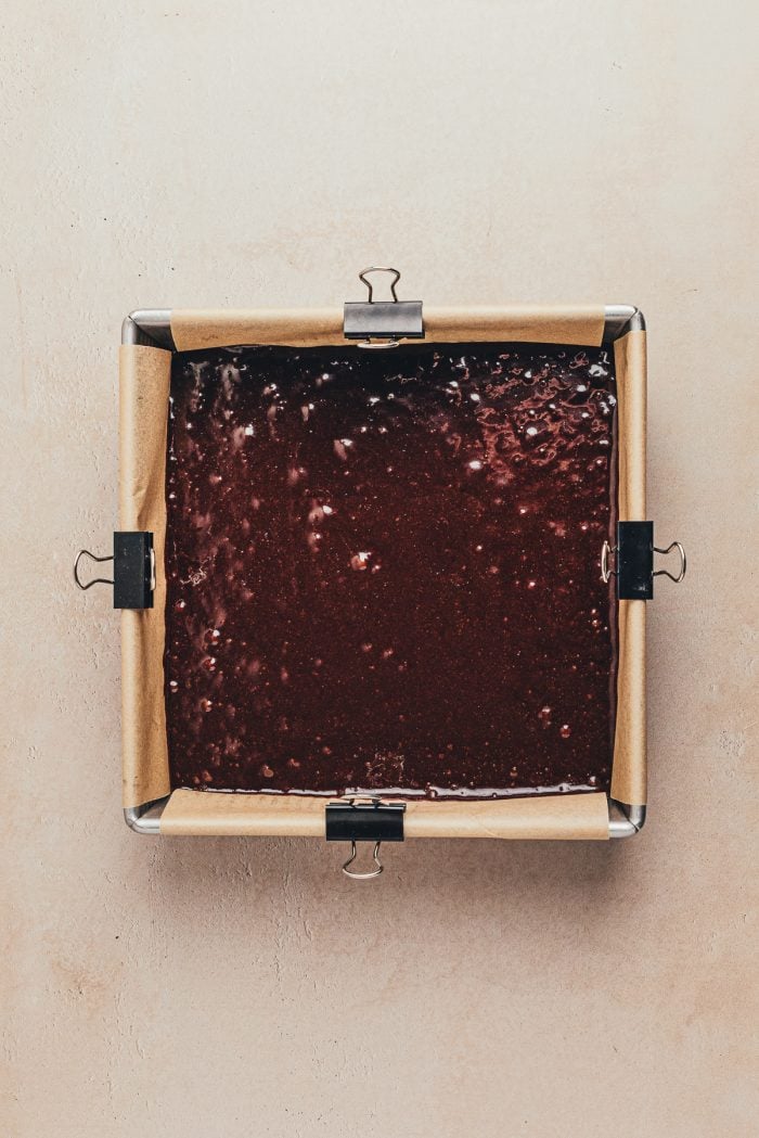 A square pan with brownie batter.