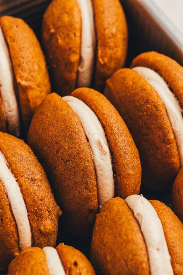 An up close picture of a pumpkin whoopie pies.