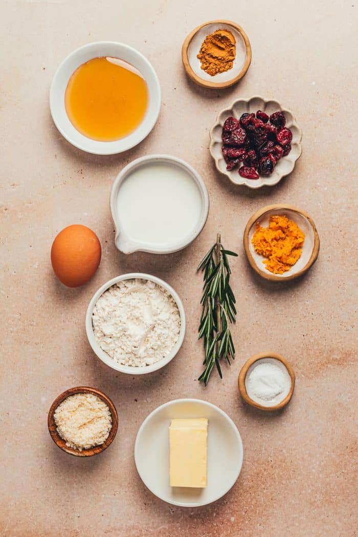Very ingredients for rosemary popovers in bowls.